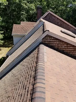 Elliot Home Improvement Logo