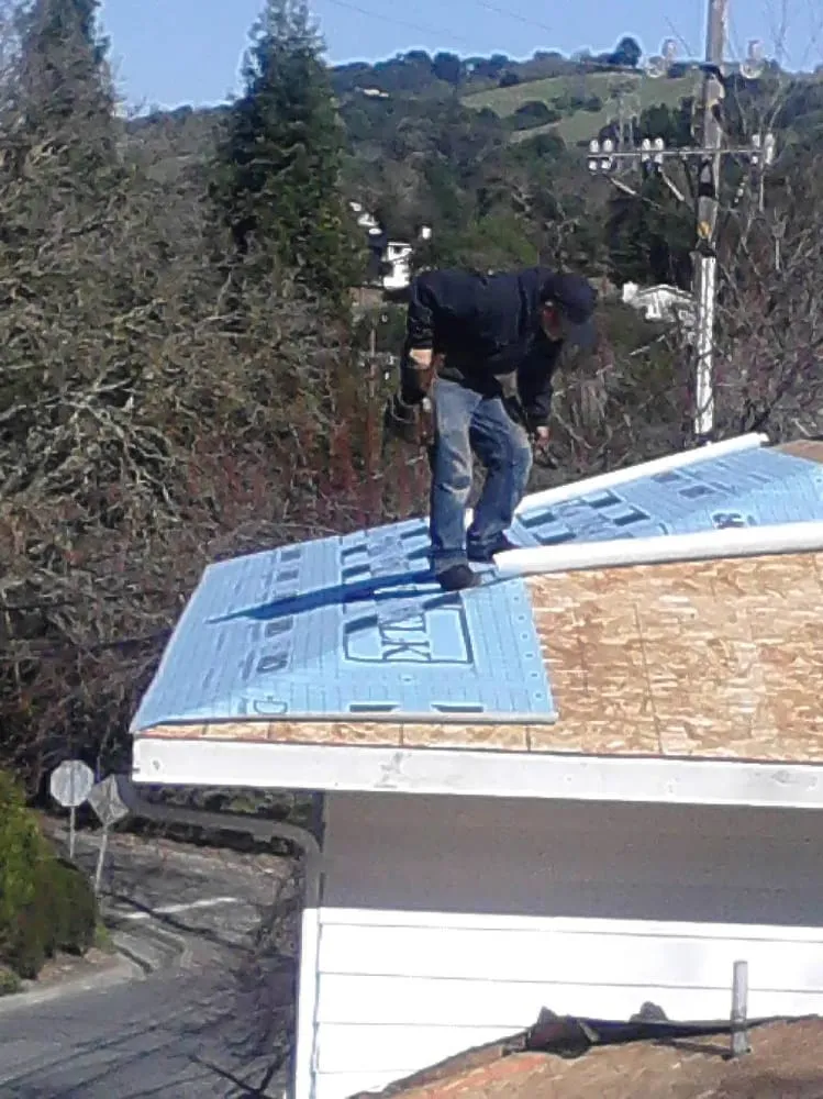 Slide of Elliott & Son Roofing