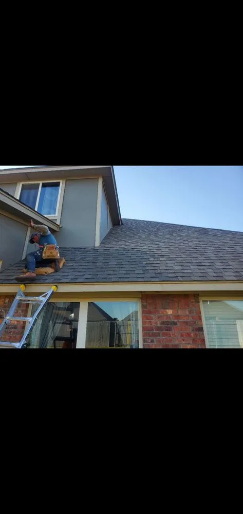 Slide of Elliott Roofing