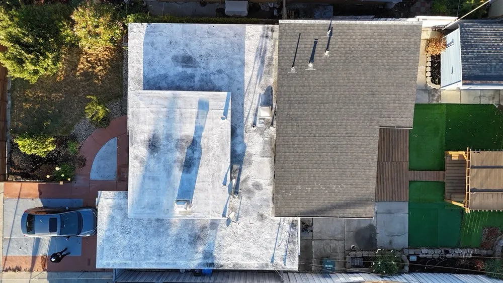 Slide of ELM Roofing Contractors