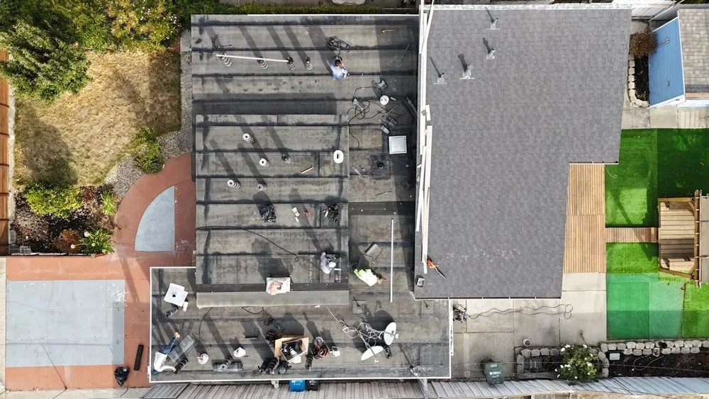 Slide of ELM Roofing Contractors