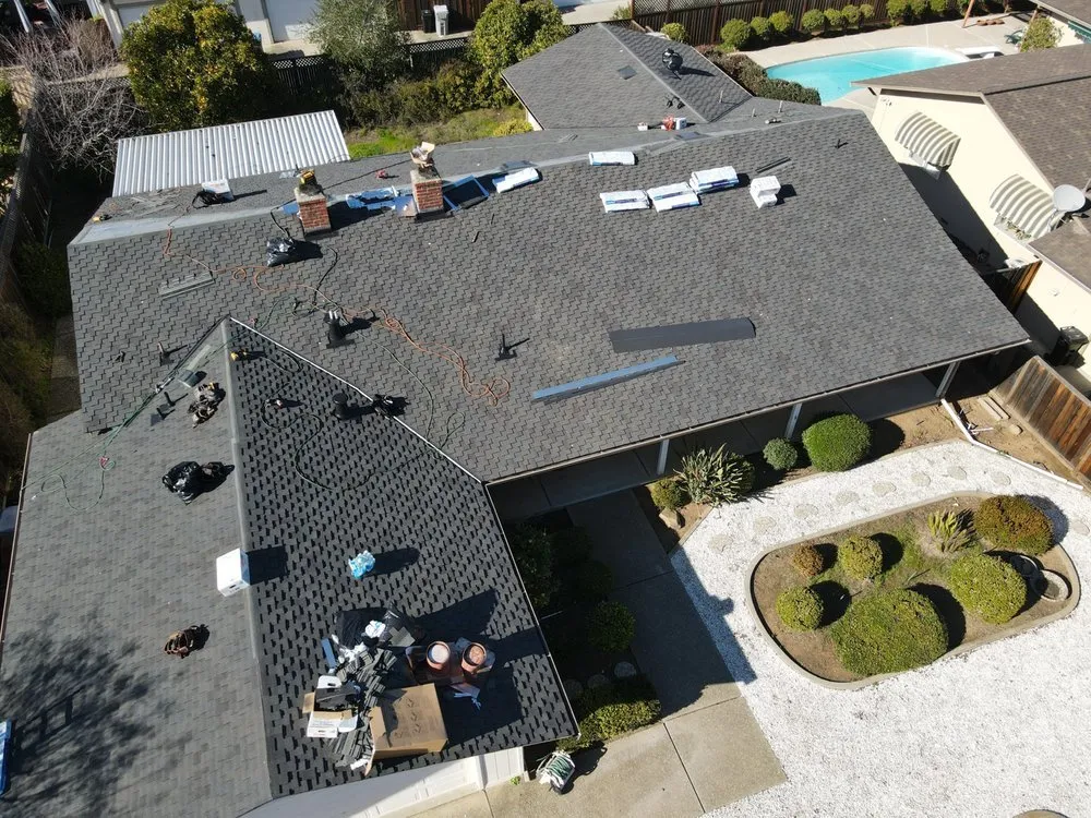 Slide of ELM Roofing Contractors