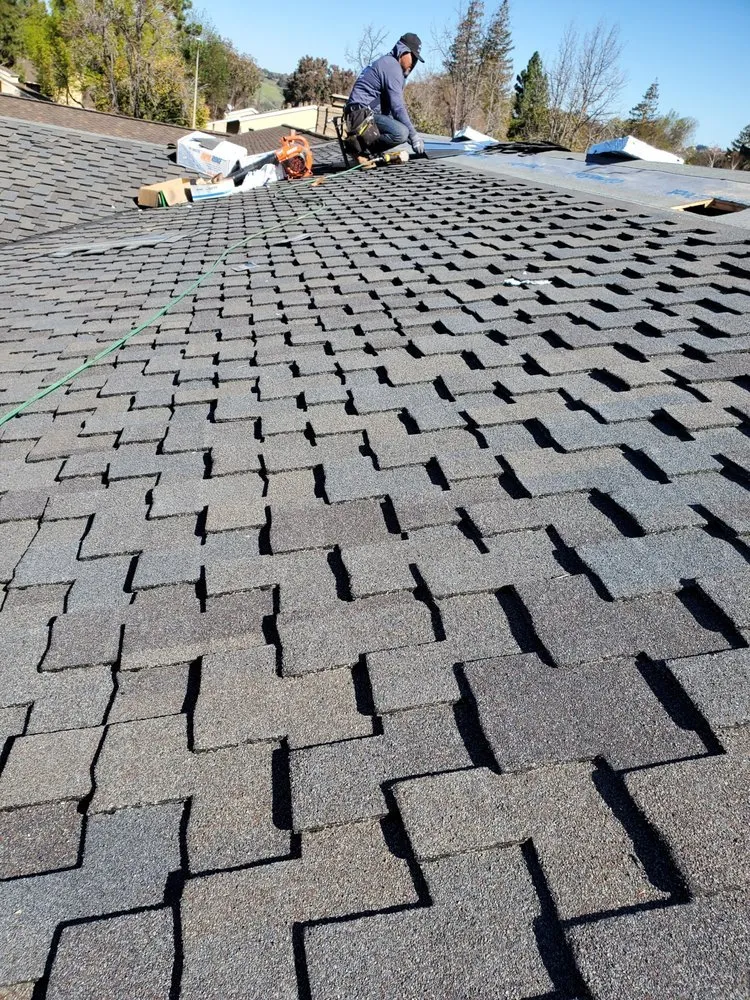 Slide of ELM Roofing Contractors