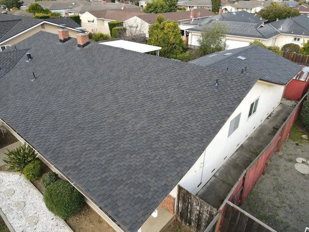 Slide of ELM Roofing Contractors