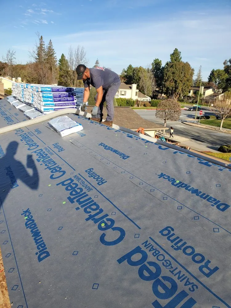 Slide of ELM Roofing Contractors