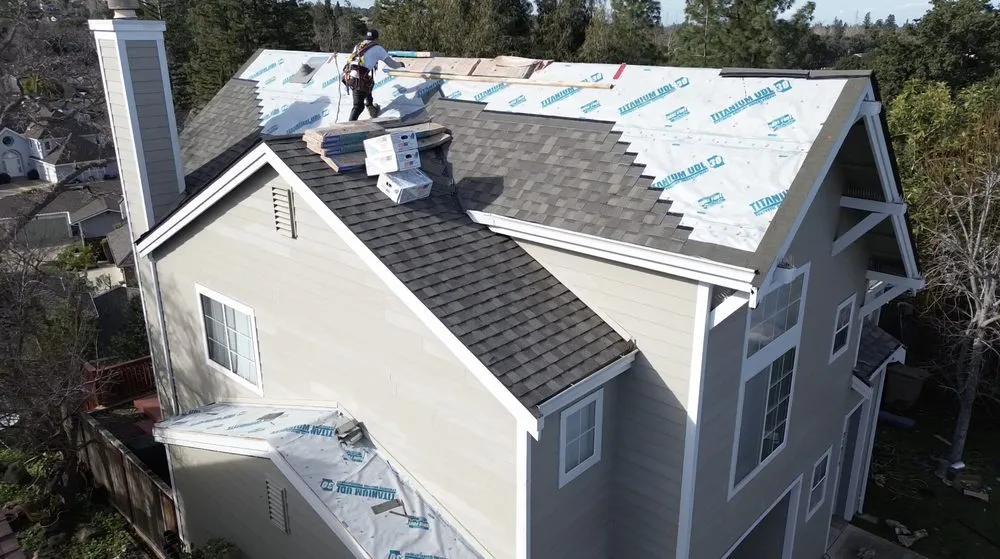 Slide of ELM Roofing Contractors