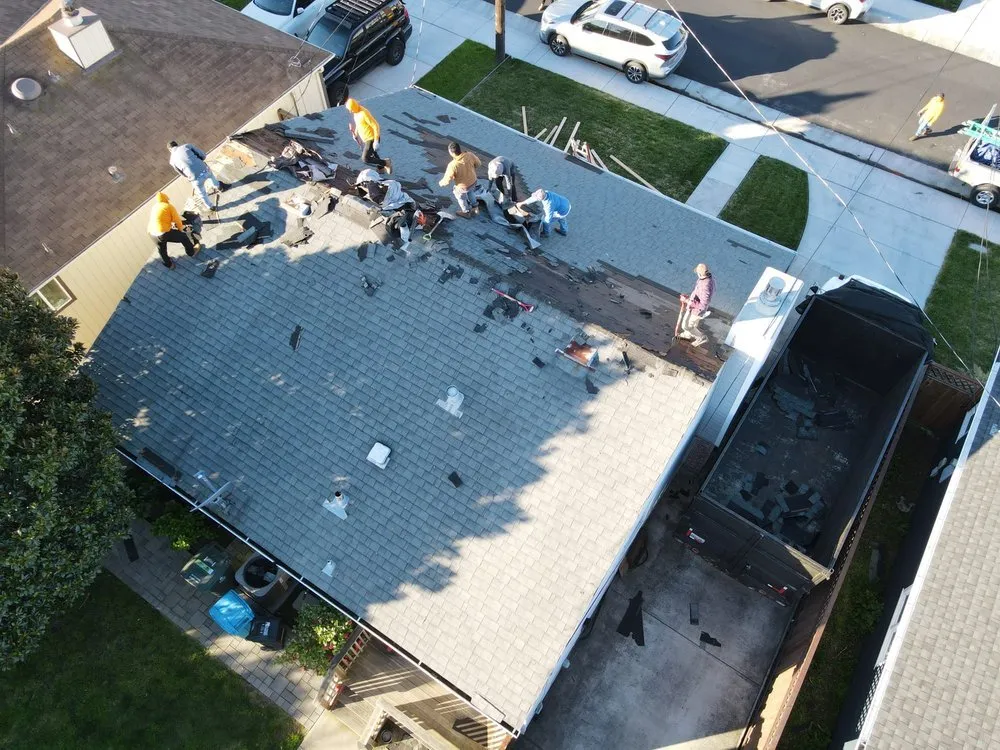 Slide of ELM Roofing Contractors