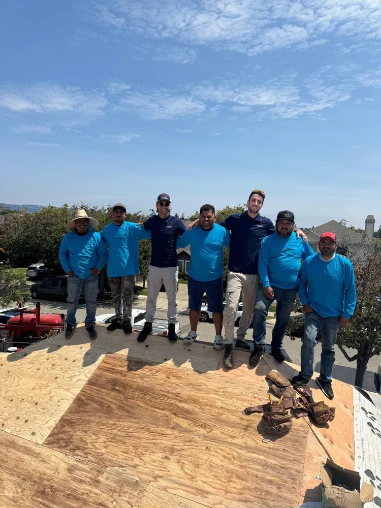 Slide of ELM Roofing Contractors