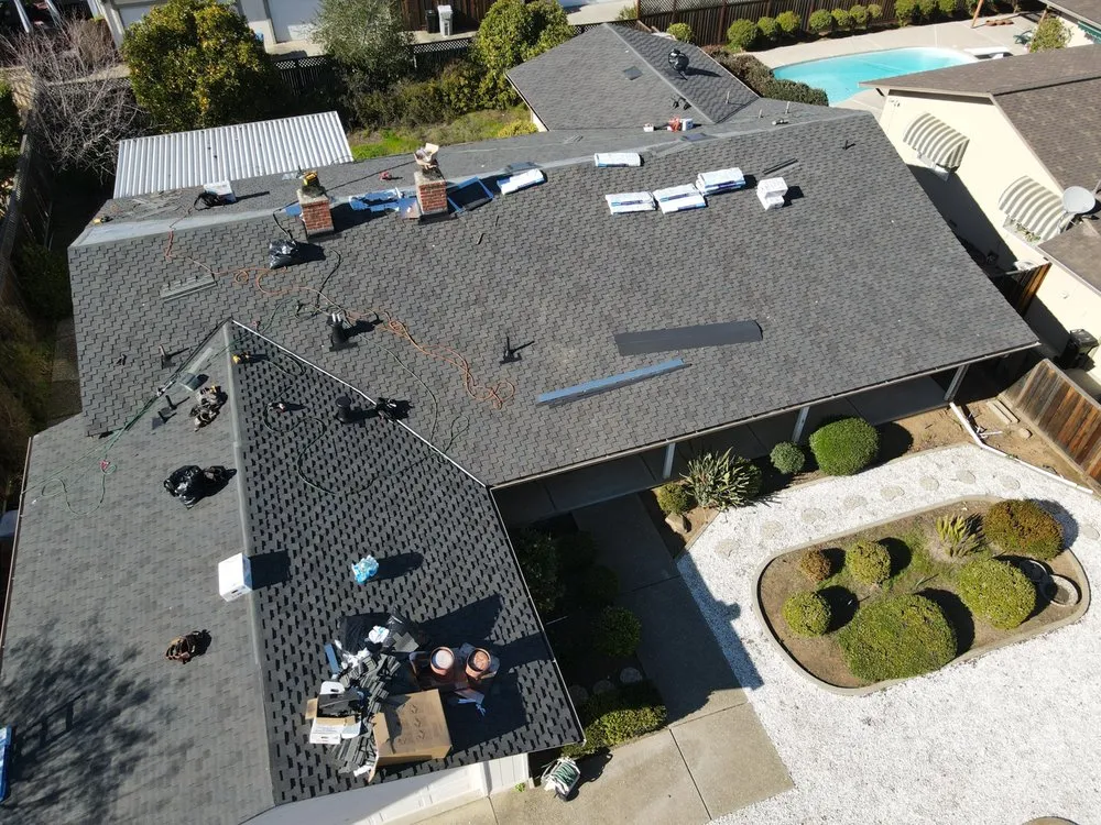 Slide of ELM Roofing Contractors