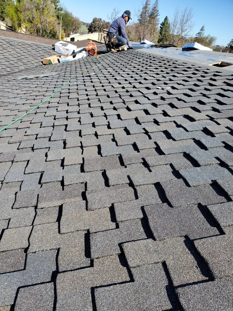 Slide of ELM Roofing Contractors