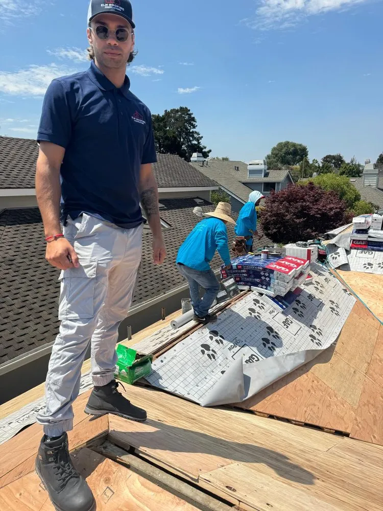 Slide of ELM Roofing Contractors