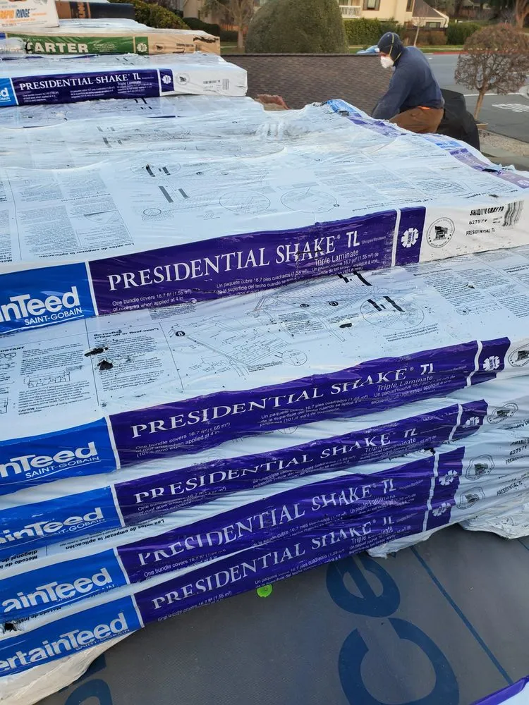 Slide of ELM Roofing Contractors