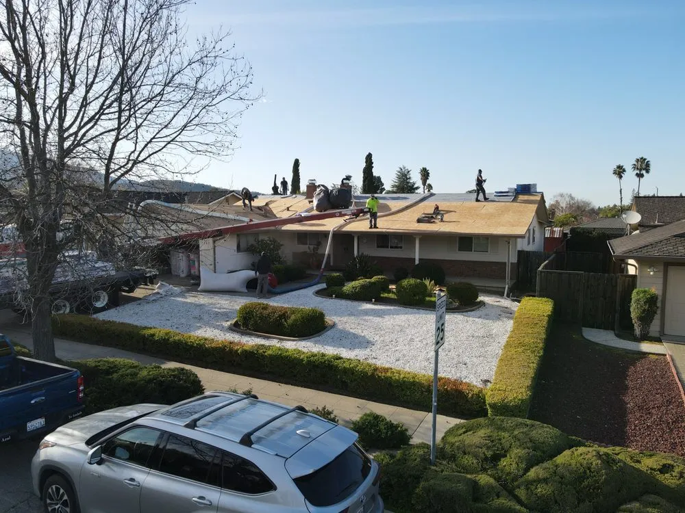 Slide of ELM Roofing Contractors