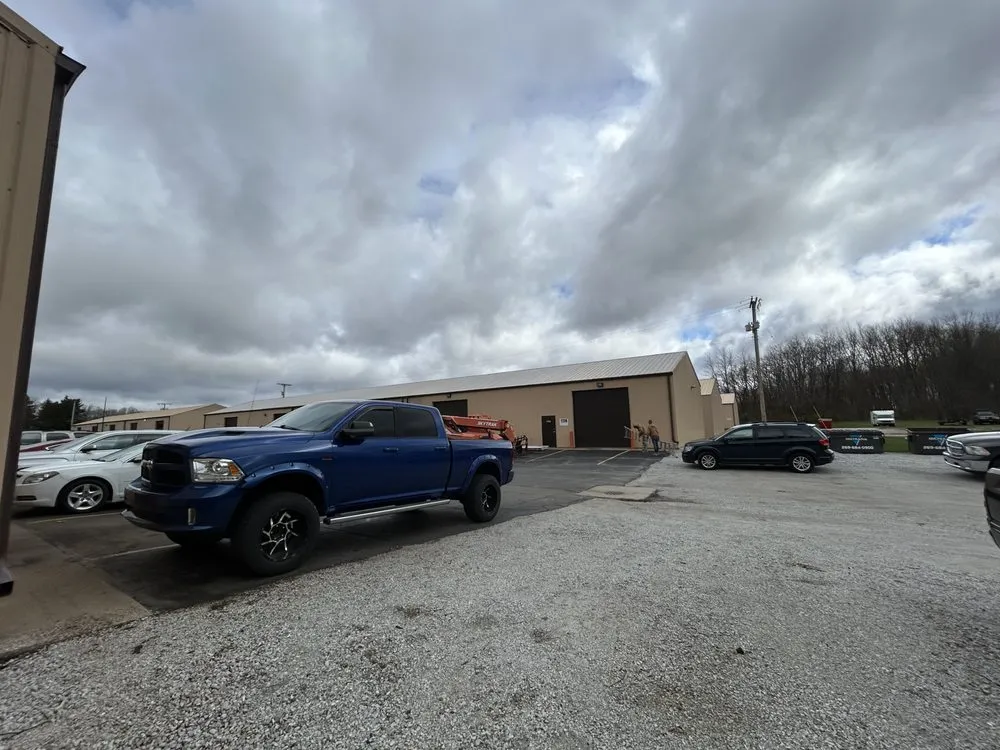 Slide of Elmer’s Roofing & Siding