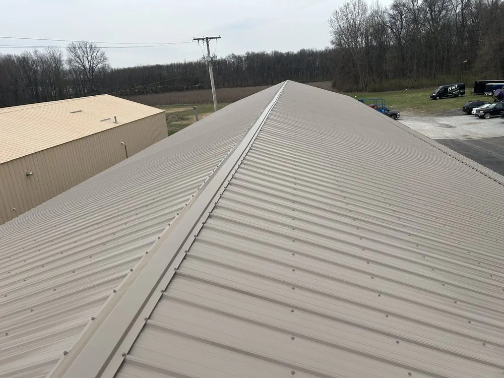 Slide of Elmer’s Roofing & Siding