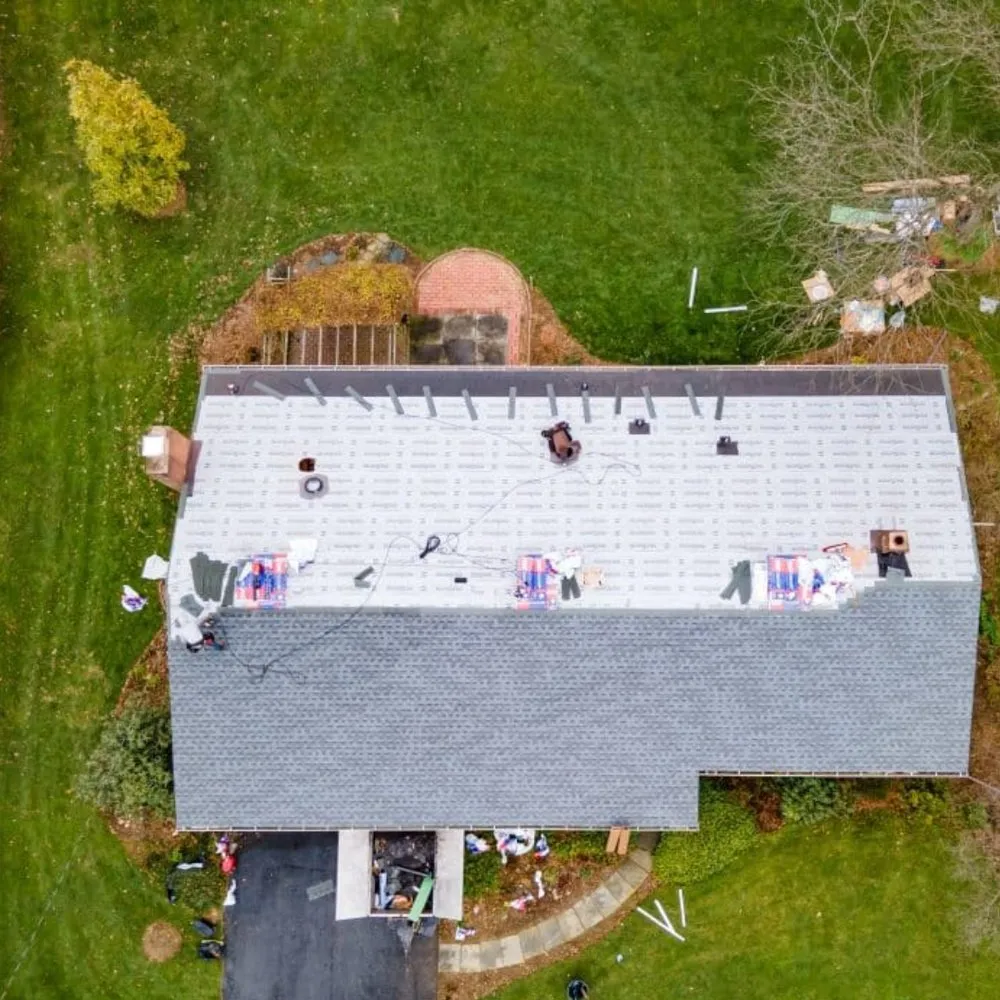 Slide of Elmer's Roofing