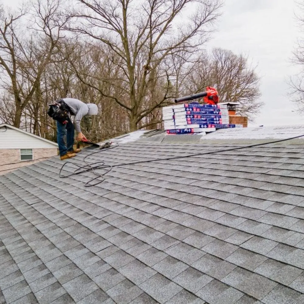 Slide of Elmer's Roofing