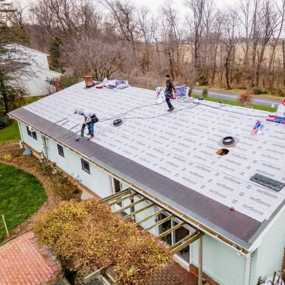 Slide of Elmer's Roofing