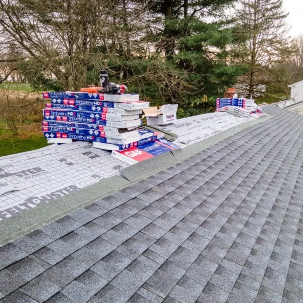 Slide of Elmer's Roofing