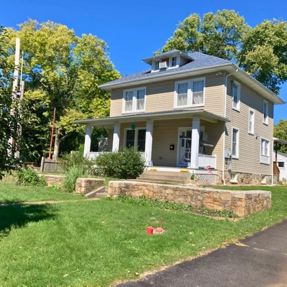 Slide of Elmer's Roofing
