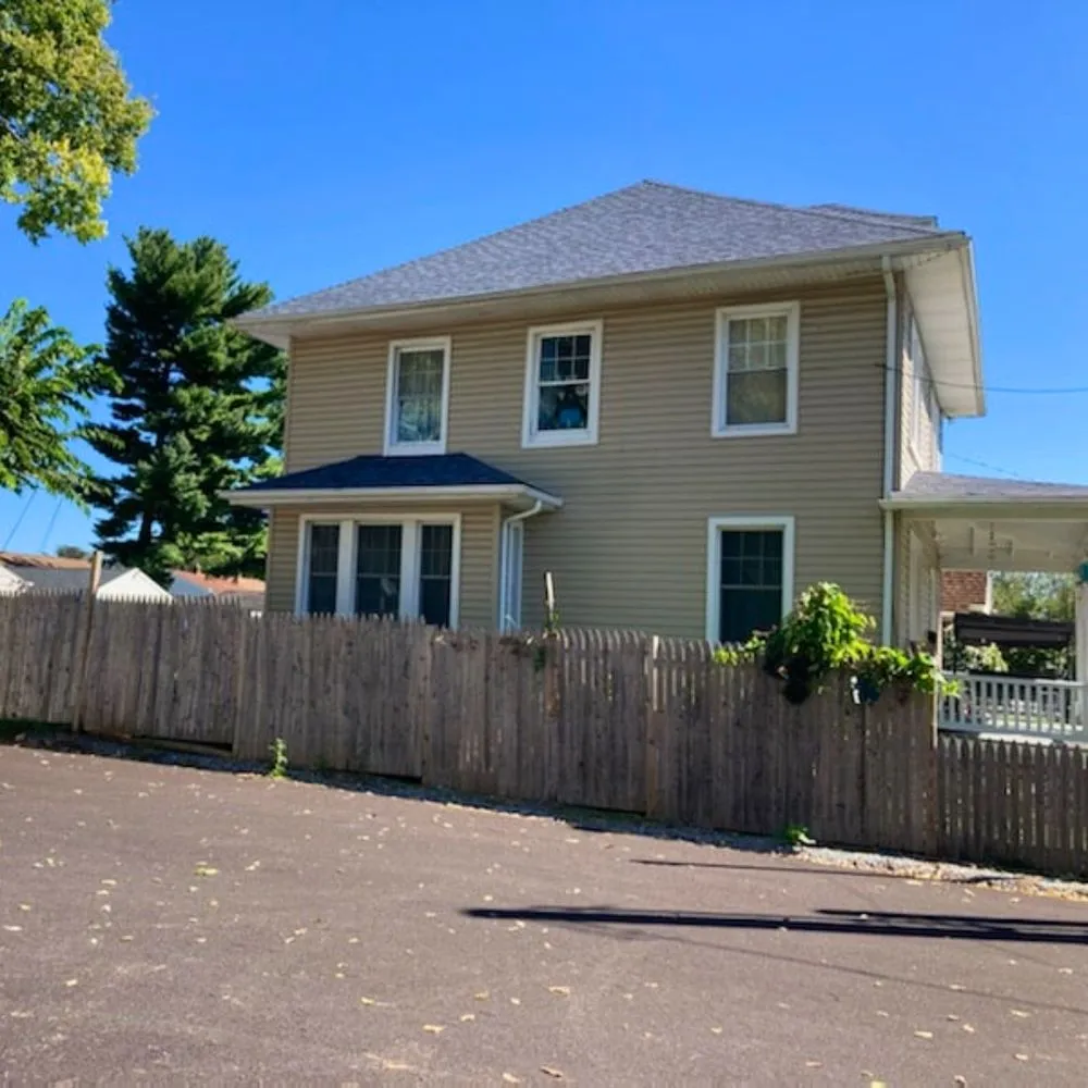 Slide of Elmer's Roofing