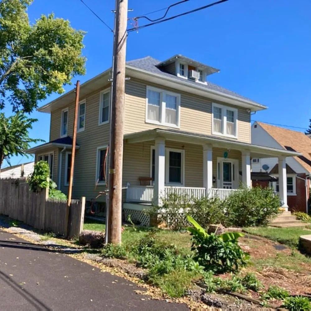 Slide of Elmer's Roofing