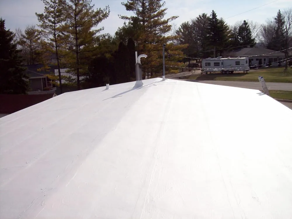 Slide of Elmer's Roofing Service