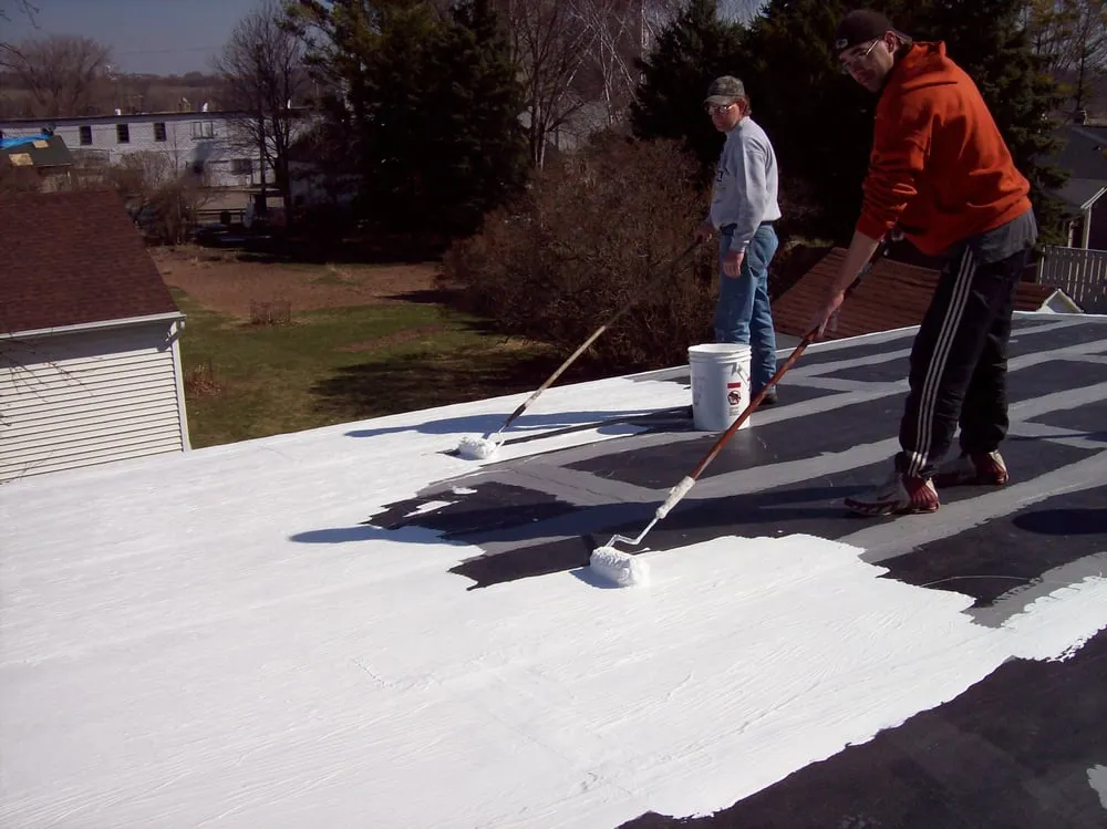 Slide of Elmer's Roofing Service