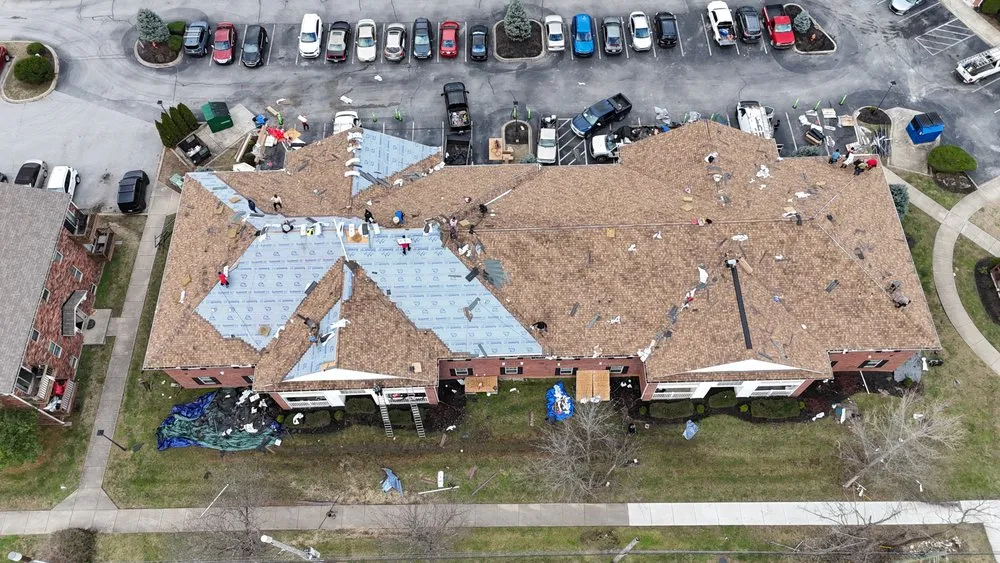 Slide of Elmes Roofing and Renovations