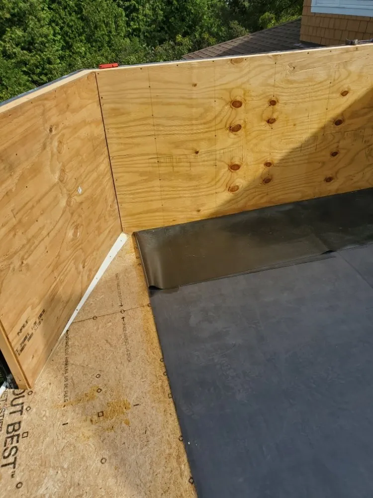 Expert flat roof repair with free inspection across Saint Albans City, VT - Elys Roofing and Carpentry