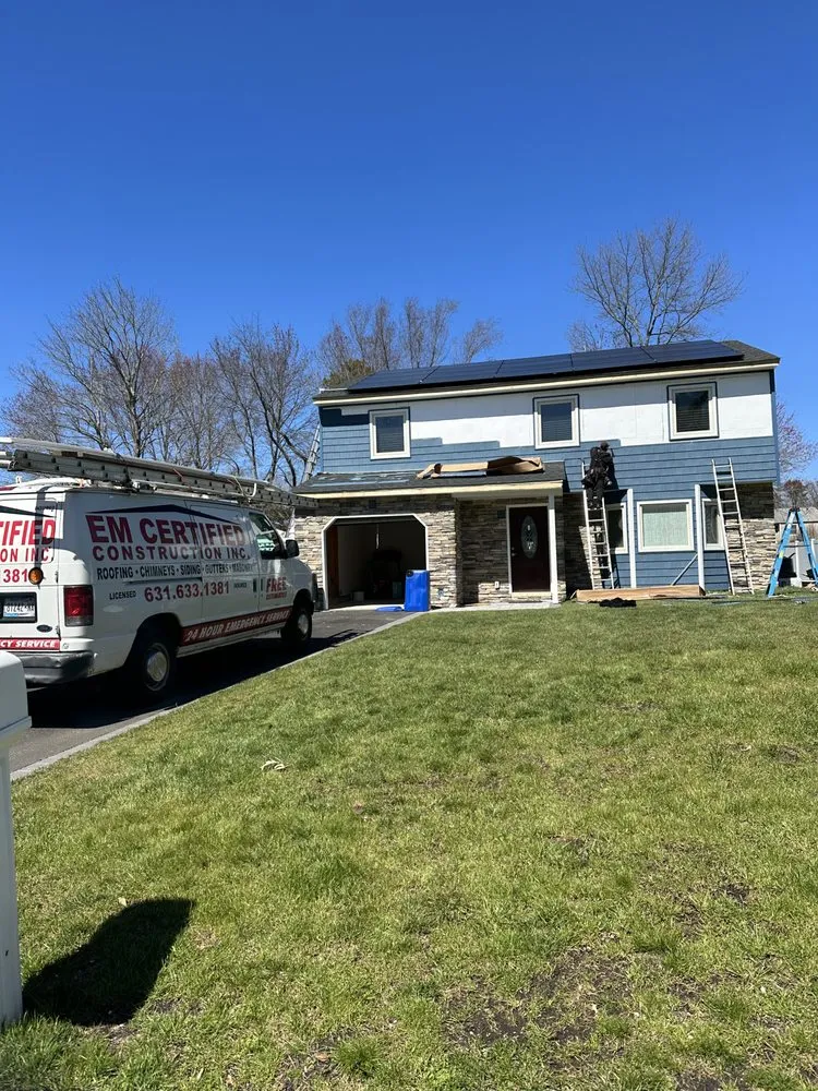 Slide of EM Certified Construction