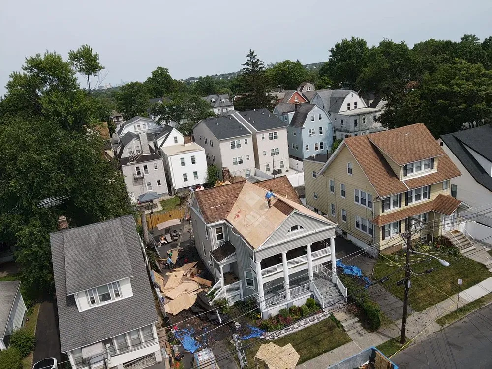 Slide of EM Pro Roofing and Siding