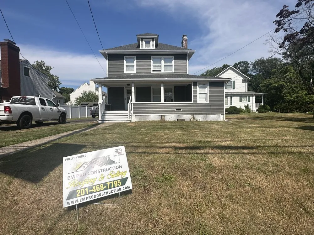 Slide of EM Pro Roofing and Siding