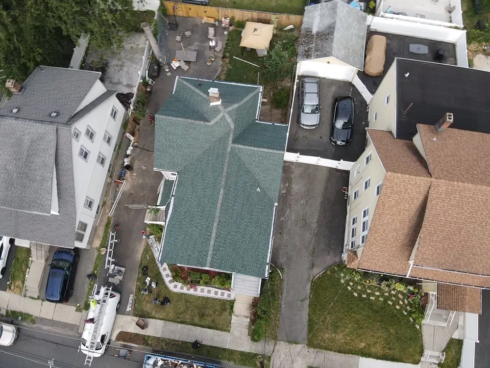 Slide of EM Pro Roofing and Siding