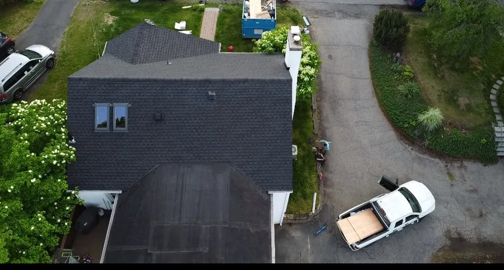 Slide of EM Pro Roofing and Siding