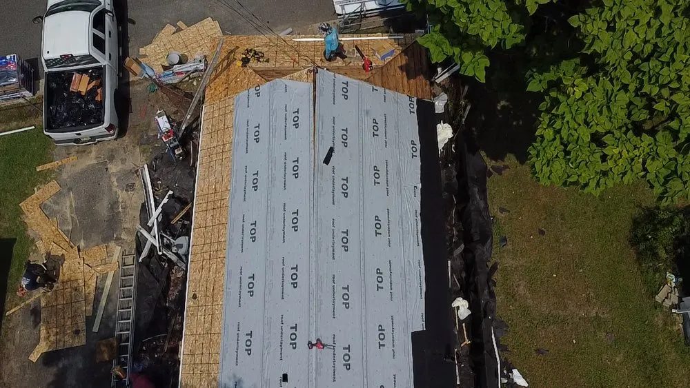 Slide of EM Pro Roofing and Siding