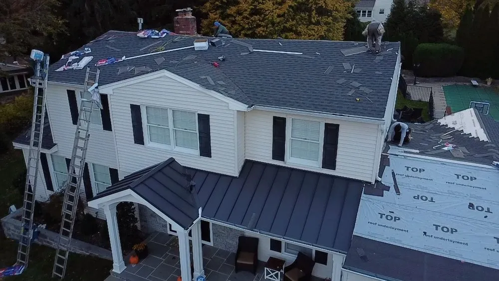 Slide of EM Pro Roofing and Siding