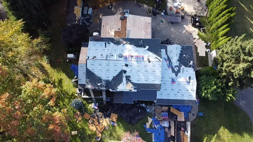 Slide of EM Pro Roofing and Siding