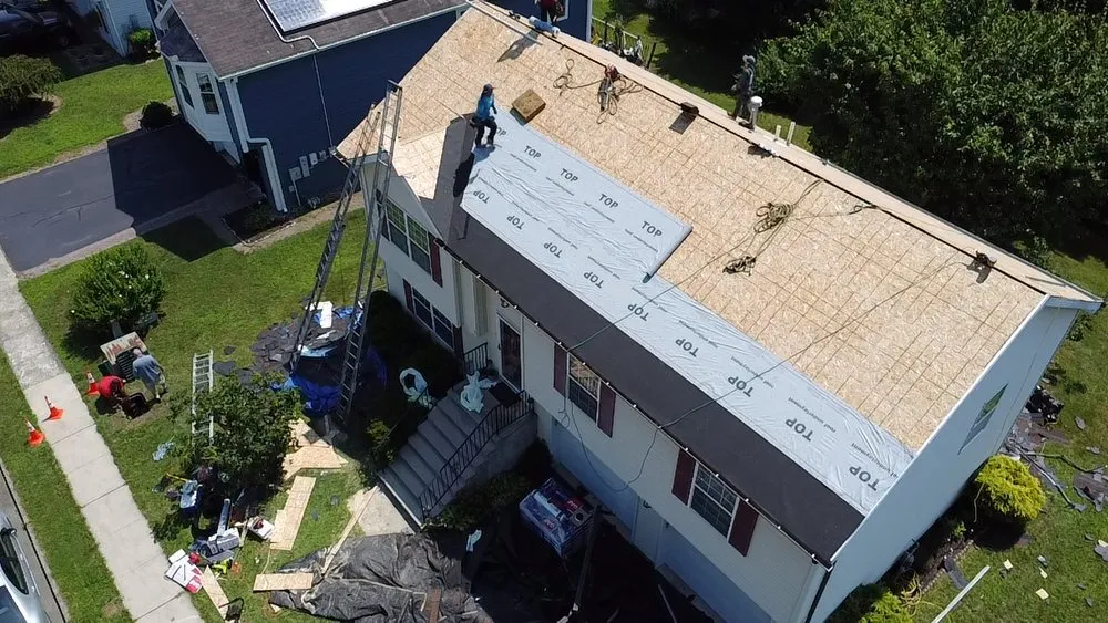 Slide of EM Pro Roofing and Siding