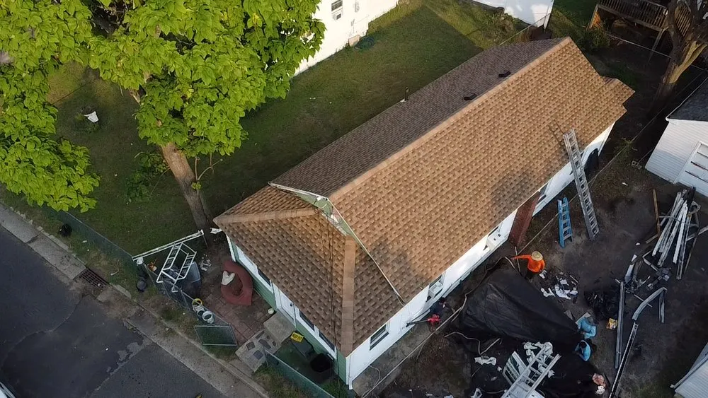 Slide of EM Pro Roofing and Siding