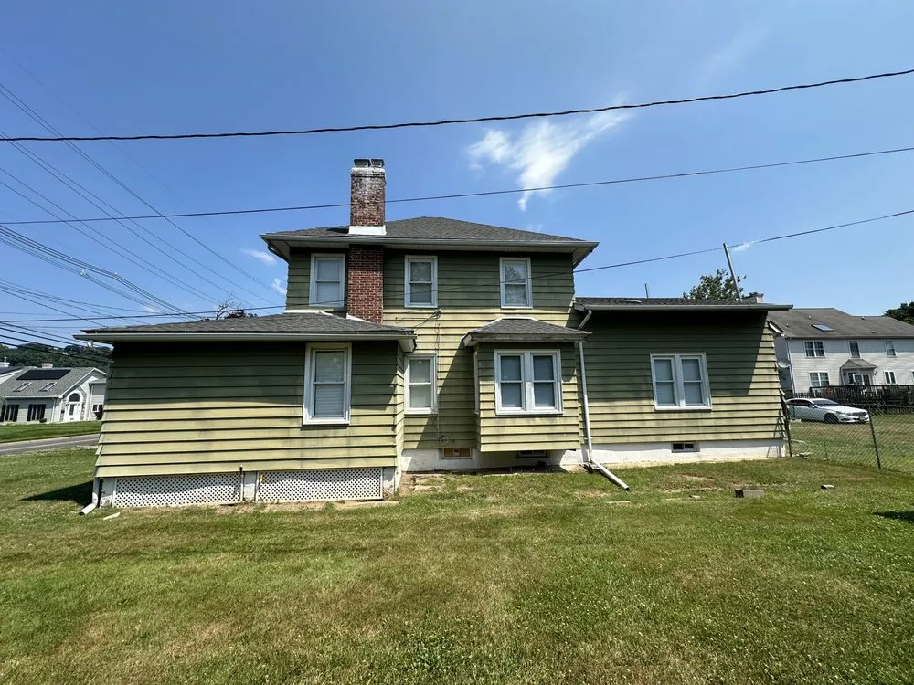 Slide of EM Pro Roofing and Siding