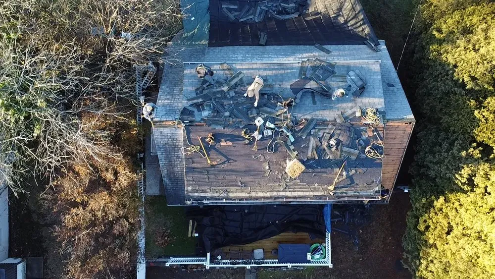 Slide of EM Pro Roofing and Siding