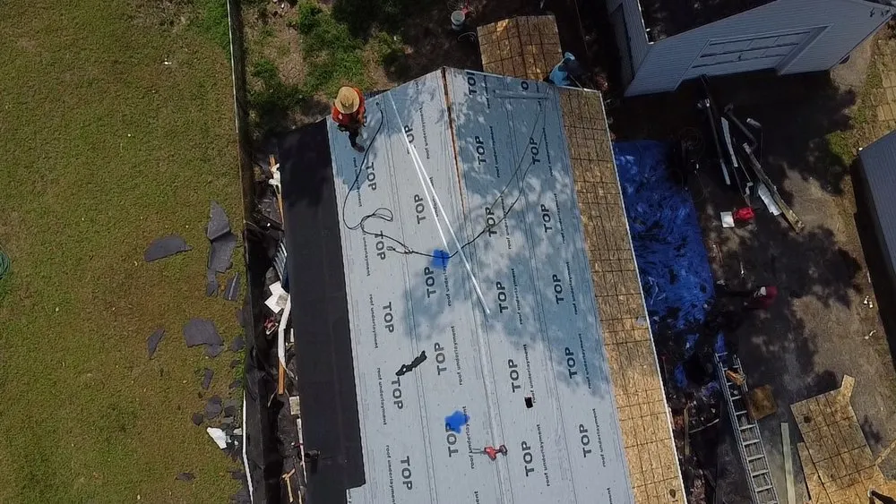 Slide of EM Pro Roofing and Siding