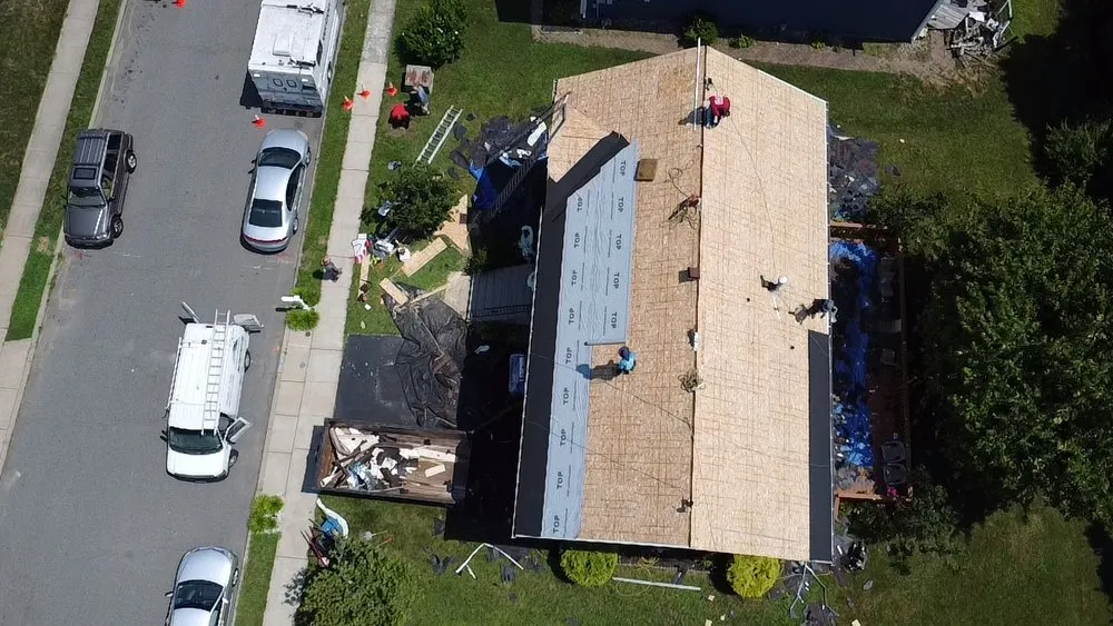 Slide of EM Pro Roofing and Siding