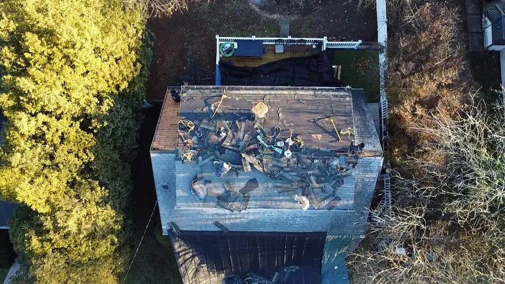 Slide of EM Pro Roofing and Siding