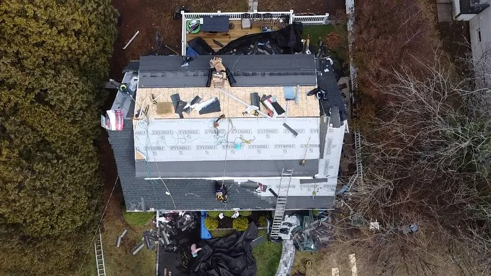 Slide of EM Pro Roofing and Siding