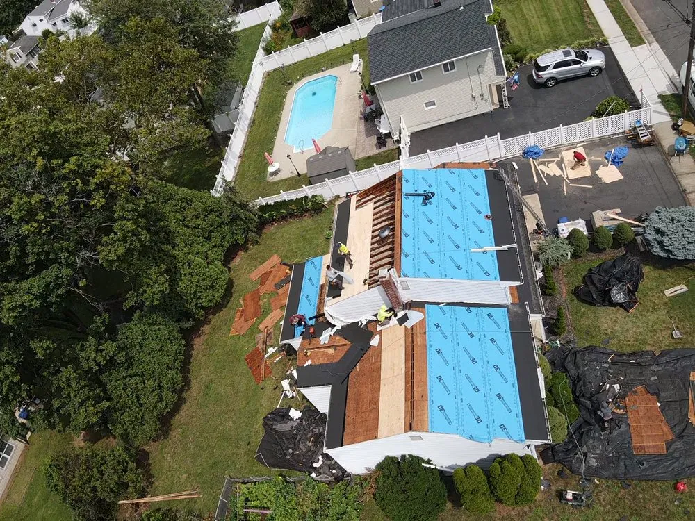 Slide of EM Pro Roofing and Siding