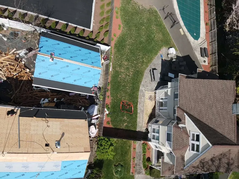 Slide of EM Pro Roofing and Siding