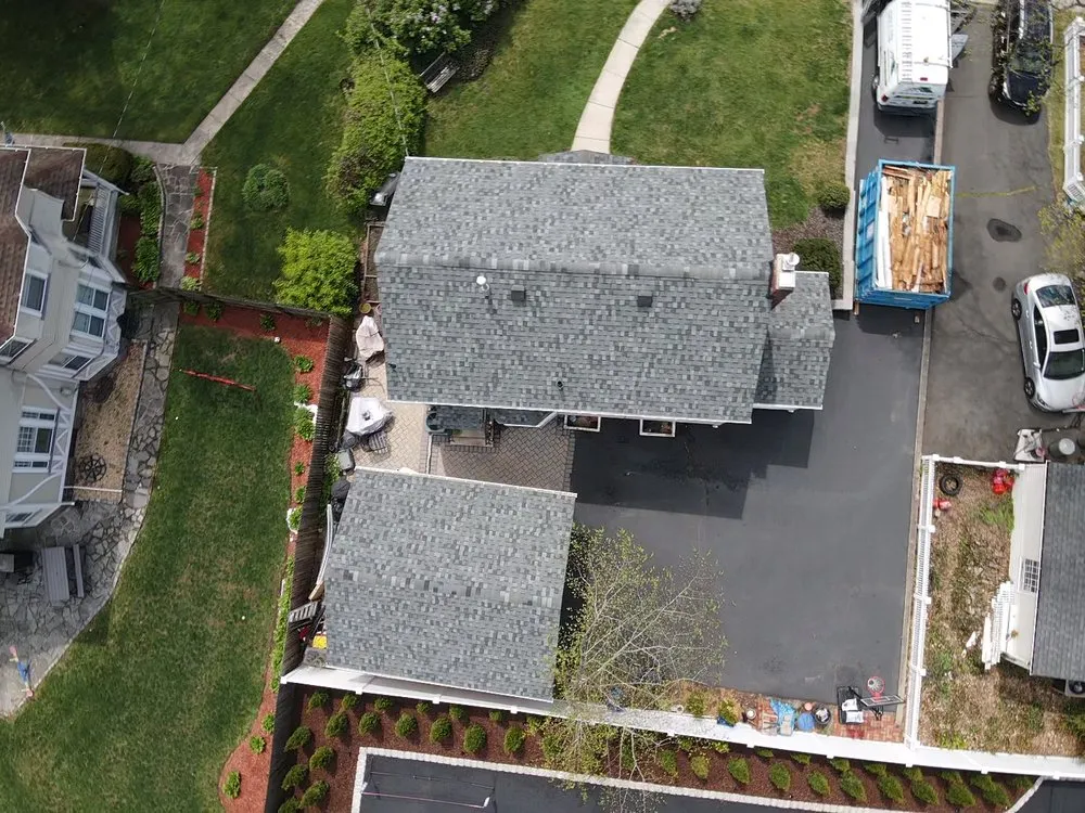 Slide of EM Pro Roofing and Siding