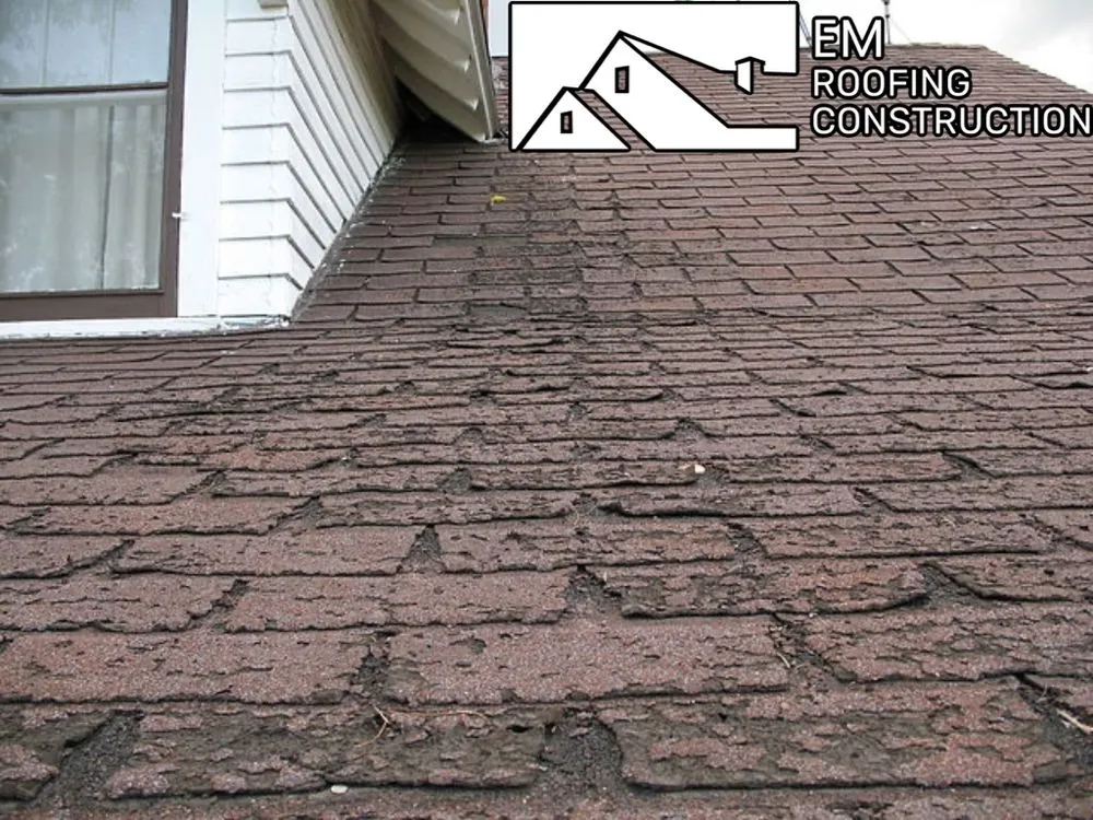 Slide of EM Roofing Construction